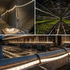LED strip 50 meter in ruwbouw, boven planten in een kas en langs een steiger op de bouwplaats