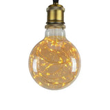 Lampe LED E27 filament G95 fil de cuivre 1,5W 2100K ambre